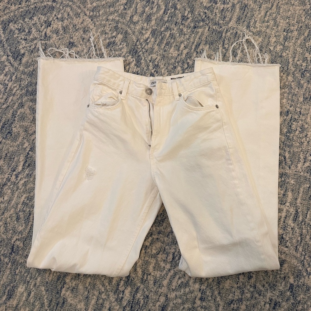 White ripped zara jeans in great condition! Only worn once